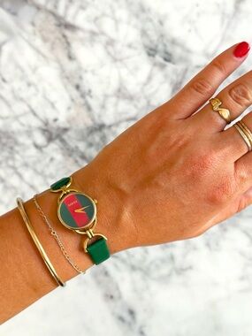 Gucci Gold-Tone Bracelet Watch with Green Strap and Red/Green Dial